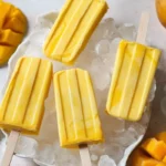 Mango yogurt popsicles on ice
